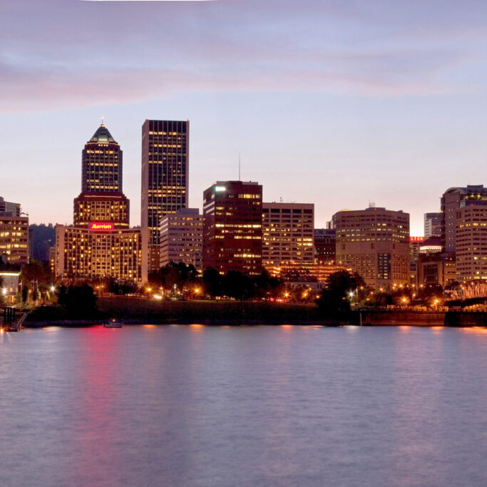 Portland_skyline_at_night_from_across_the_Willamette_River
